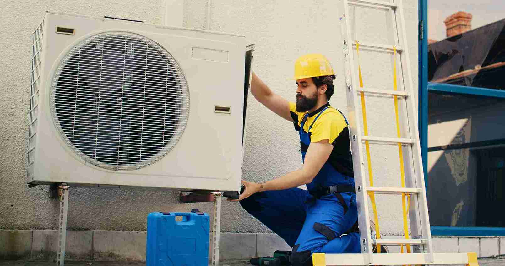 worker-works-air-conditioner